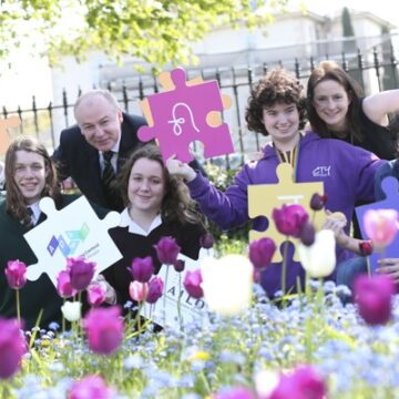 Team Ireland members Luke Gardiner of Gonzaga College, Niamh Lynch of Loreto Letterkenny, Ethan Hamman of Newpark Comprehensive, and Shmuel Barron of Sutton Park School pictured with Prof. Vincent Wade, CEO, ADAPT and Dr. Cara Greene, Research Outreach Coordinator, ADAPT